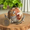 1780869095-1.webp Esfera de jaspe oceanico natural - efecto mousse chocolate