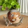 1780869095-3.webp Esfera de jaspe oceanico natural - efecto mousse chocolate